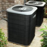 Residential Cental Air Conditioning Units On Cement Slab